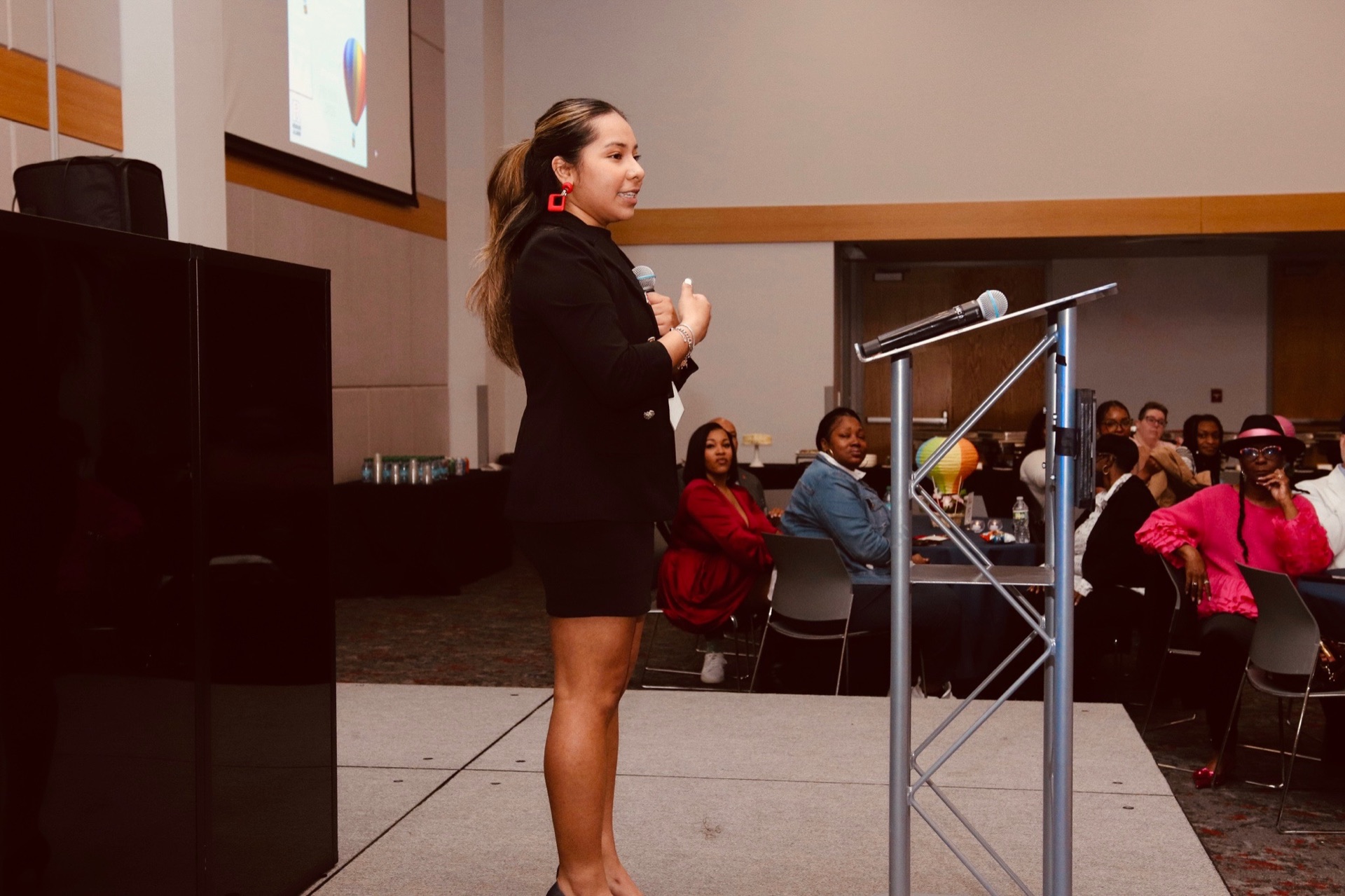 Paola on a conference mainstage
