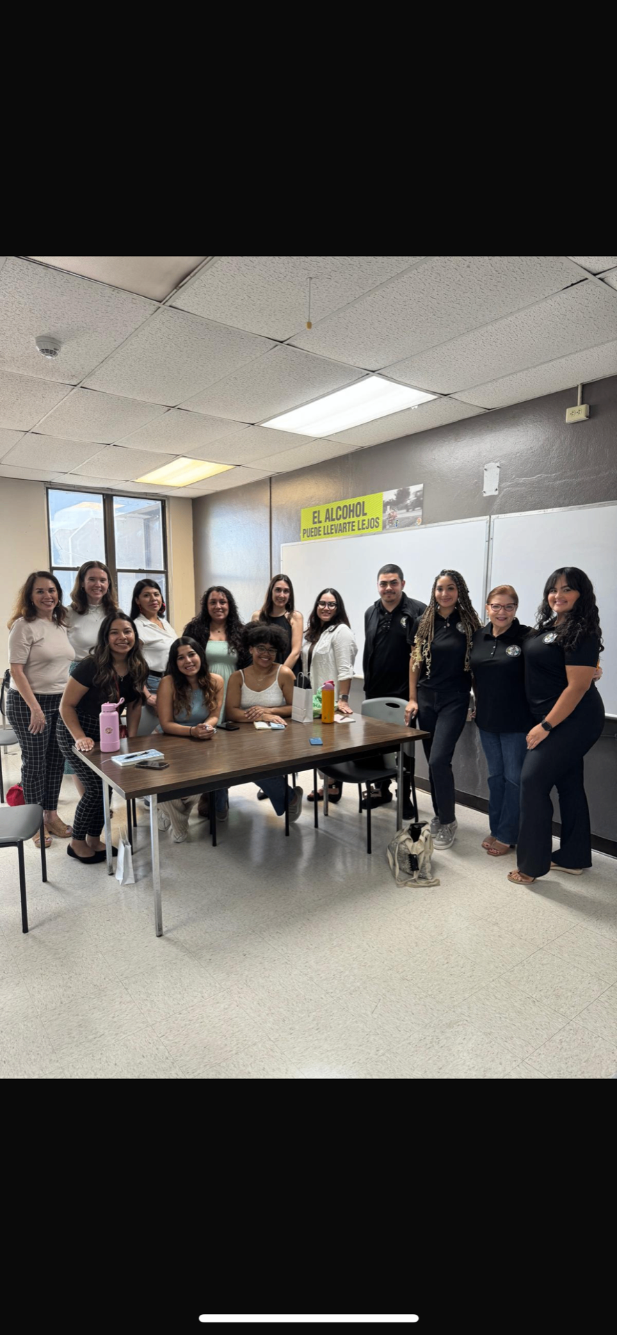 Paola with a student and leadership cohort